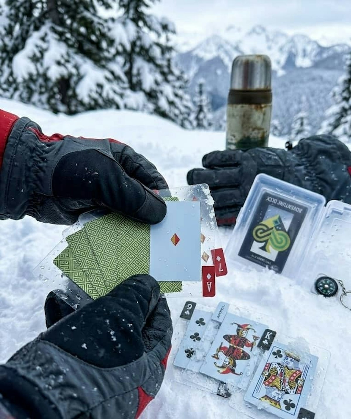 AI generated image of a card game being played on a snowy mountain