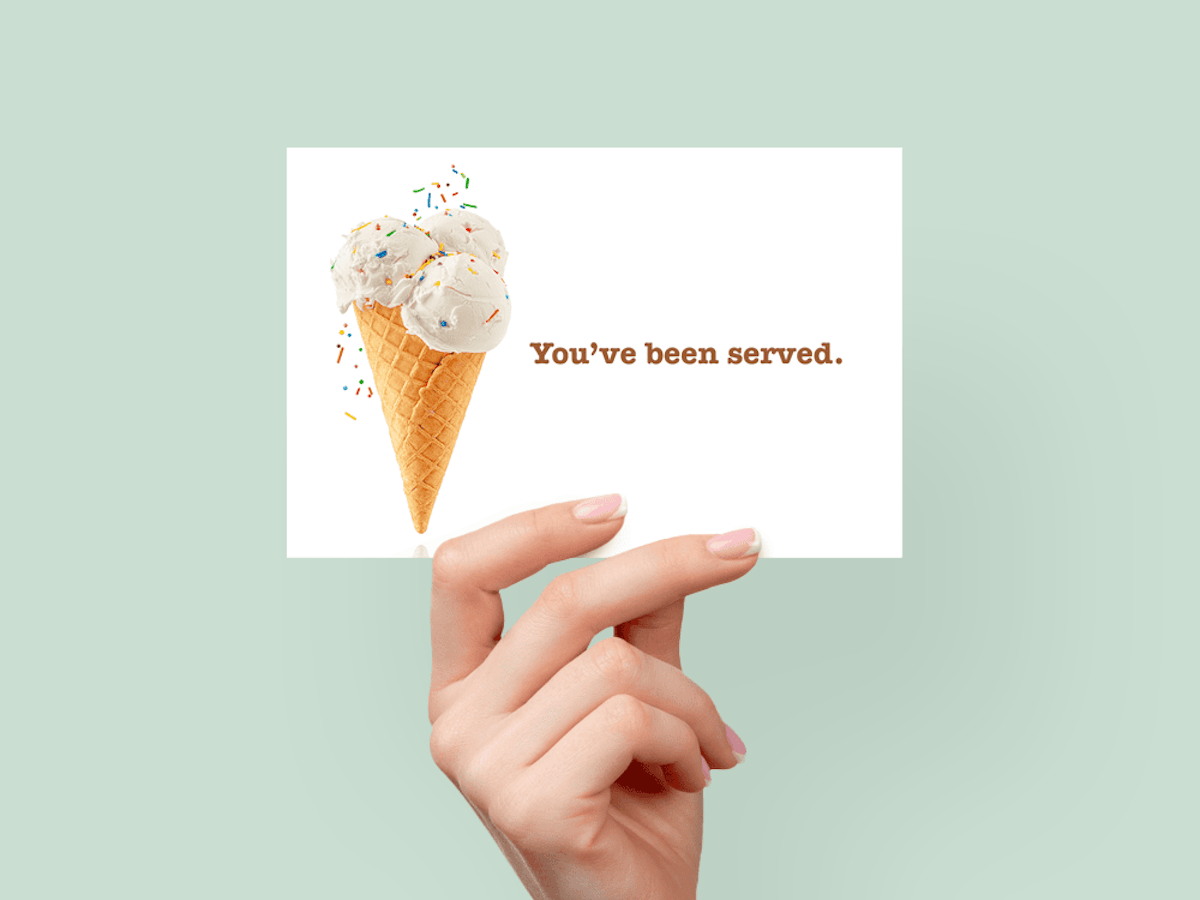 Single cone with three scoops of vanilla ice cream with sprinkles, with message 'You've been served.'