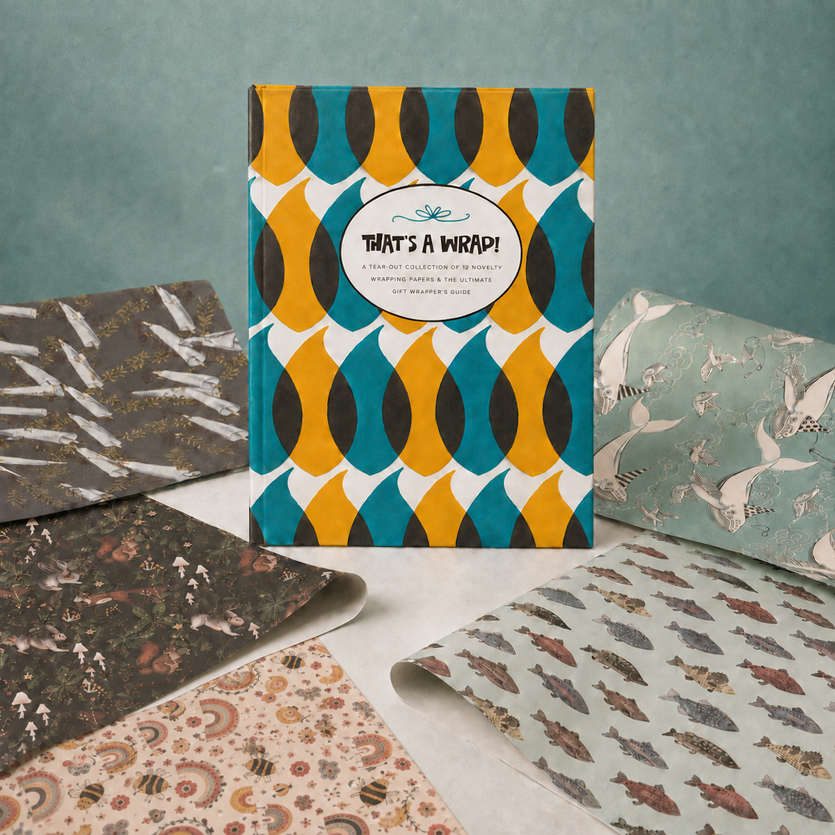 That's a Wrap book surrounded by gift wrap examples