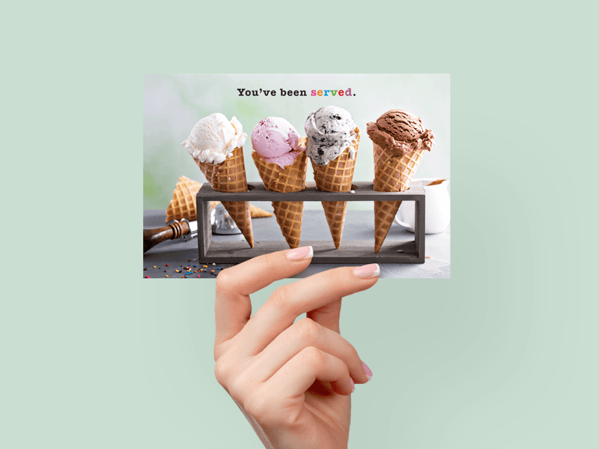 Vanilla, strawberry, chocolate chip, and chocolate ice cream cones in a holder, with message 'You've been served.'